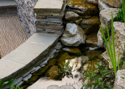 Finished water landscaping by Abbey Garden Design, Sussex