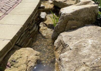 Finished water landscaping by Abbey Garden Design, Sussex