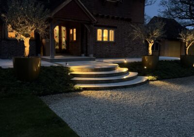 Garden lighting at dusk, Mayfield, by Abbey Garden Design, Sussex