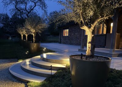 Garden lighting at dusk, Mayfield, by Abbey Garden Design, Sussex